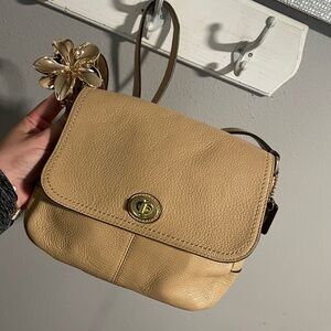 Coach Tan Leather Crossbody Bag with Gold Floral Accent